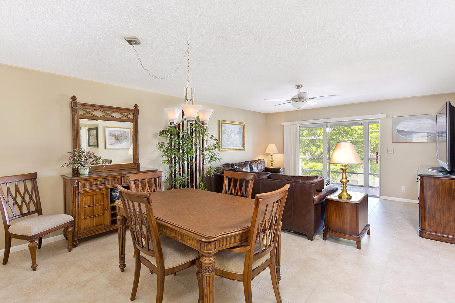 20 Southeast 13th Street, Unit C1 Boca Raton, FL 33432 - Photo 3 of 19 a view of a dining room with furniture window and outside view