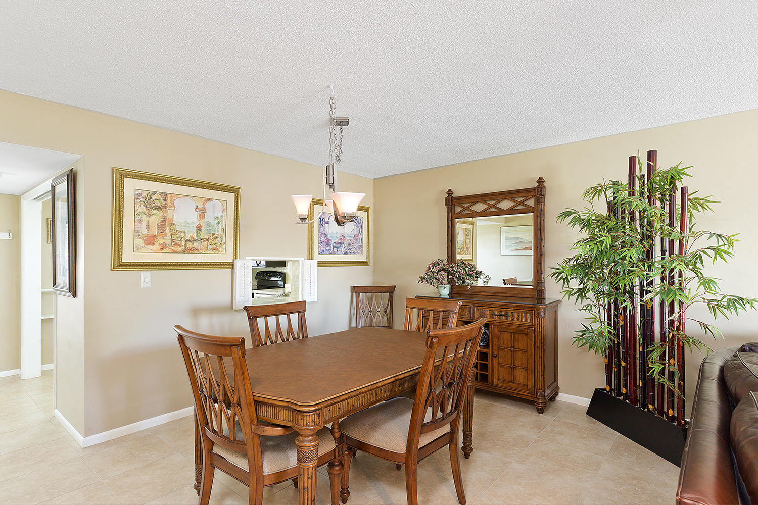 20 Southeast 13th Street, Unit C1 Boca Raton, FL 33432 - Photo 5 of 19 a view of a dining room with furniture window and wooden floor