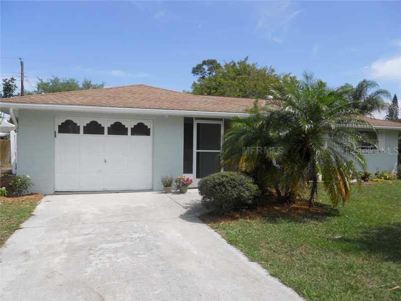 485 Beverly Road Venice, FL 34293 - Photo 1 of 1 a front view of house with yard and green space