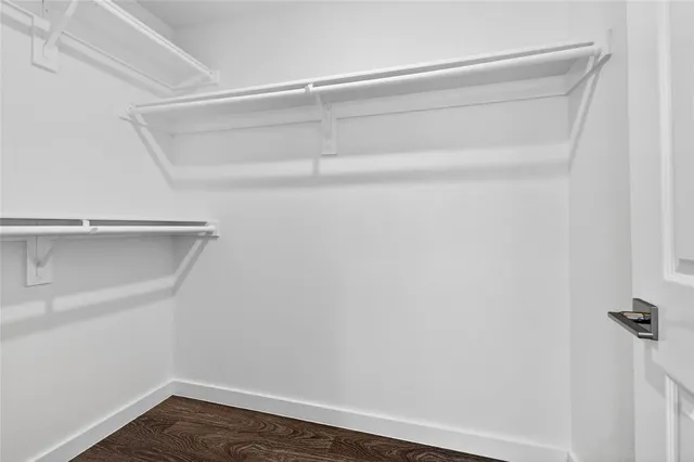 a view of an empty walk in closet