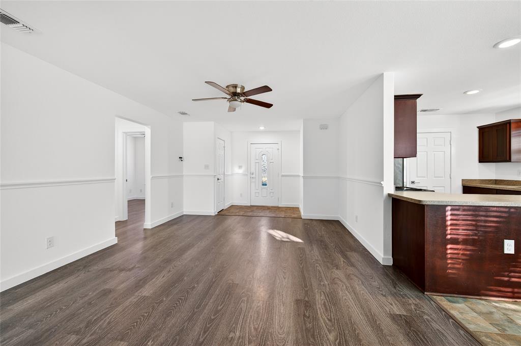 704 East Sycamore Street Sherman, TX 75090 - Photo 7 of 32 a view of kitchen with sink and refrigerator
