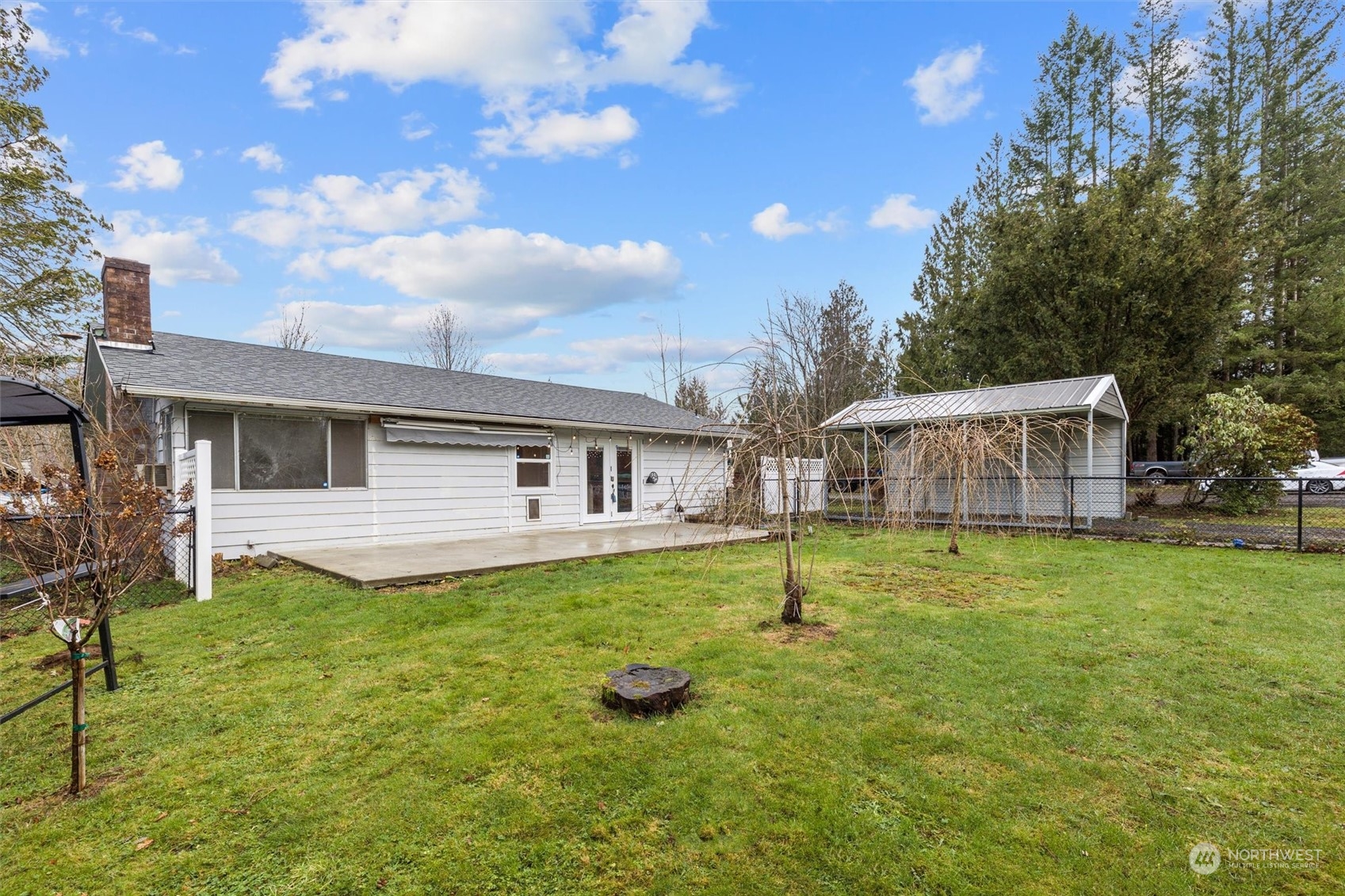 32717 Sultan Basin Road Sultan, WA 98294 - Photo 27 of 31 a house view with a garden space