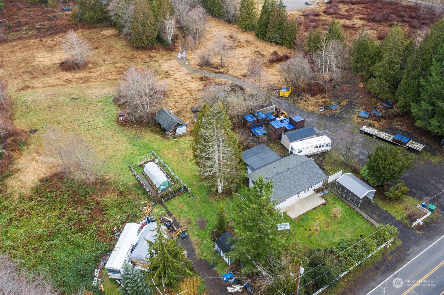 32717 Sultan Basin Road Sultan, WA 98294 - Photo 3 of 31 an aerial view of a house with a yard