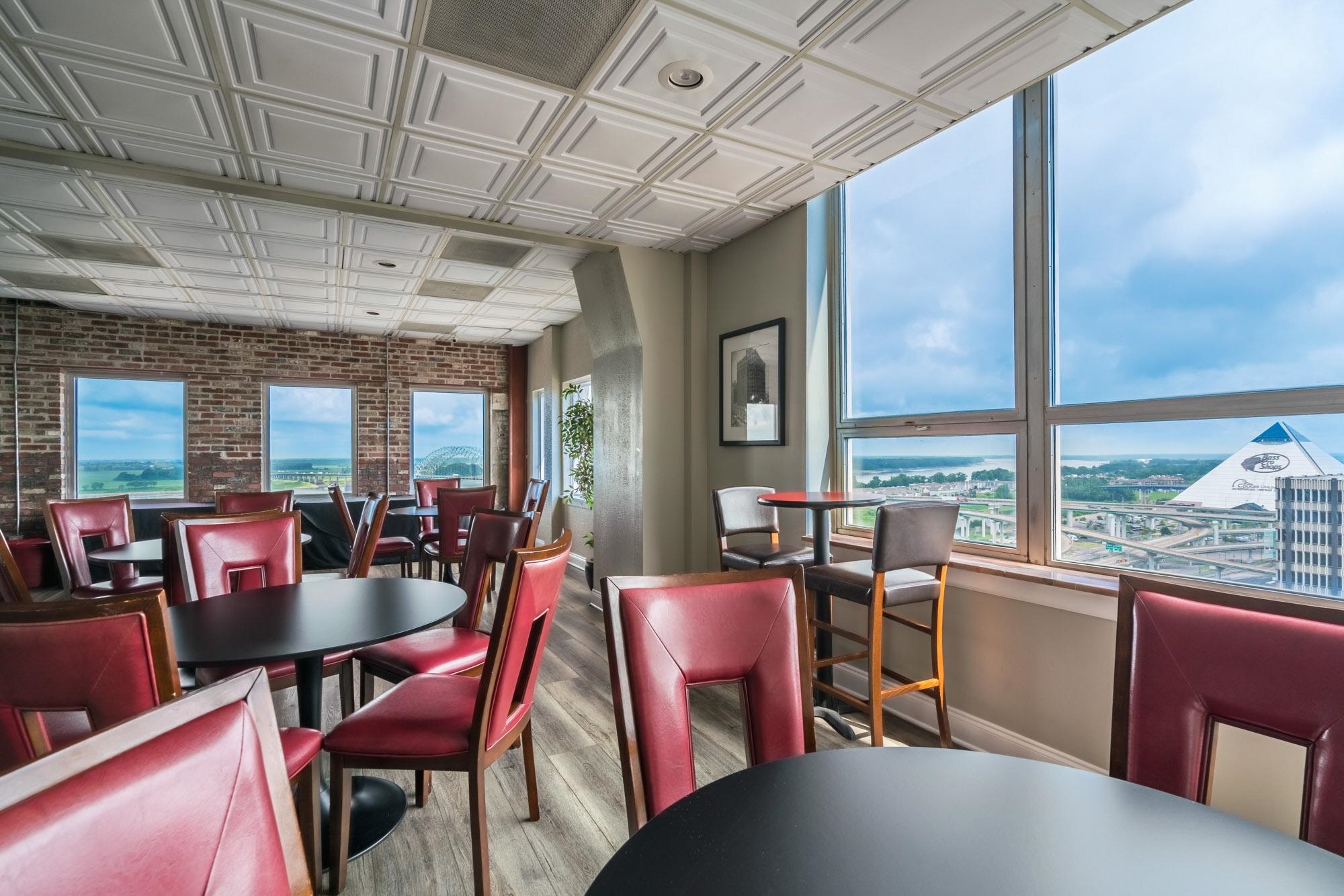 109 North Main Street, Unit 908 Memphis, TN 38103 - Photo 19 of 22 a view of a dining room with furniture window and outside view