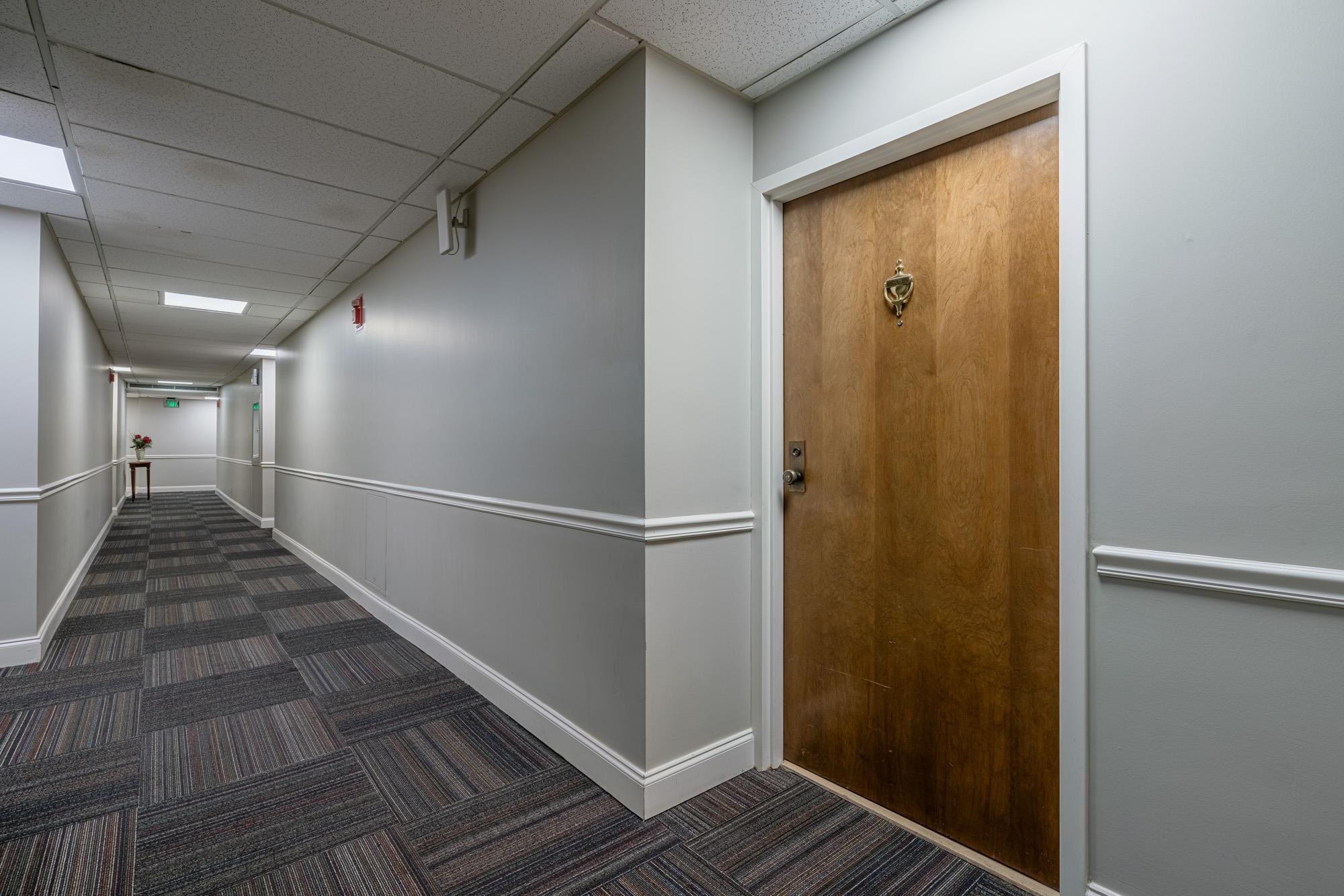 109 North Main Street, Unit 908 Memphis, TN 38103 - Photo 7 of 22 a view of entryway with wooden floor