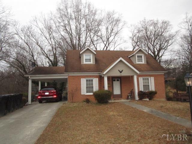 578 Arlington Road Danville, VA 24541 - Photo 2 of 3 a front view of a house with cars parked
