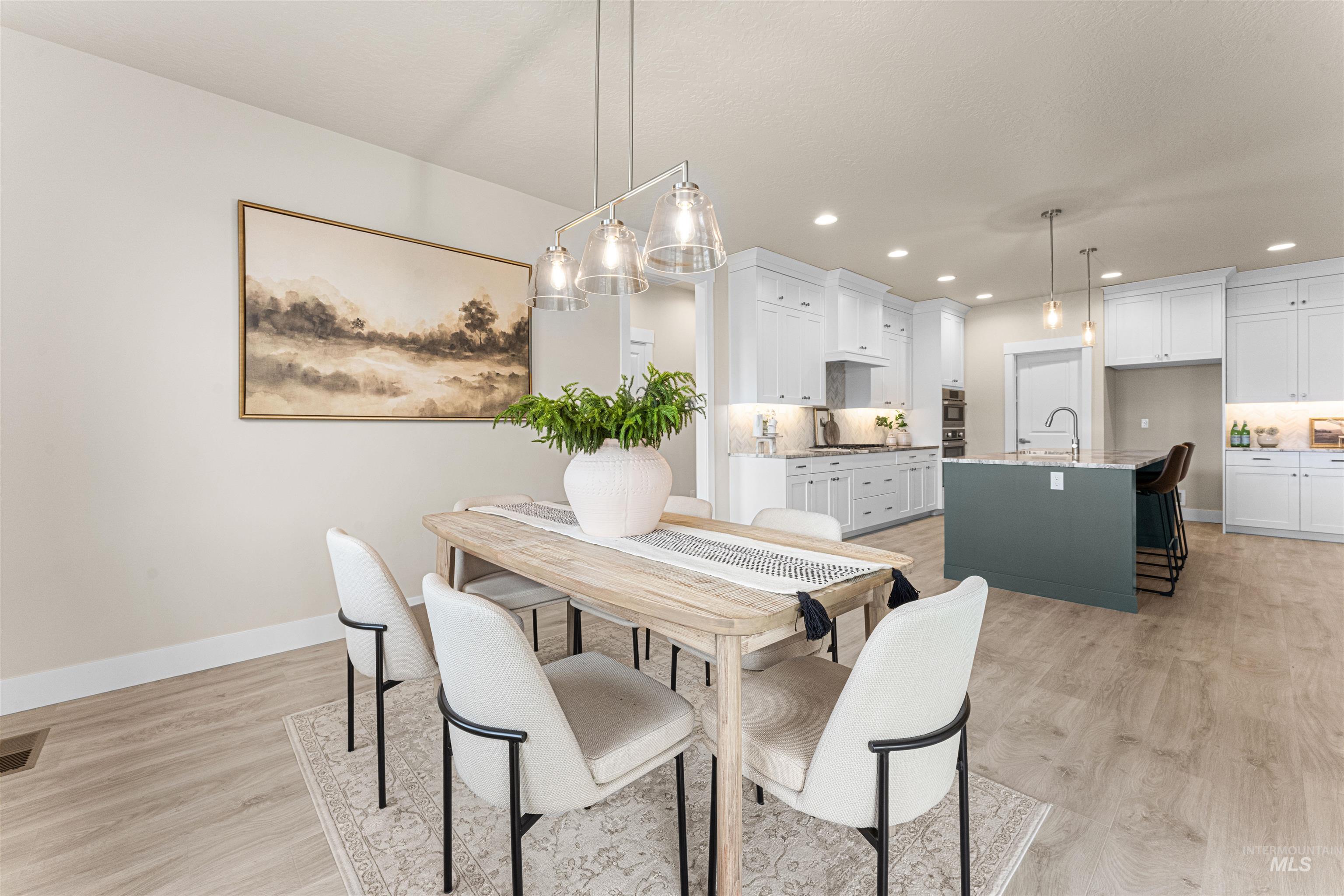 8078 Tandy Cv Street Middleton, ID 83644 - Photo 16 of 40 Dining room featuring light wood-style flooring and recessed lighting