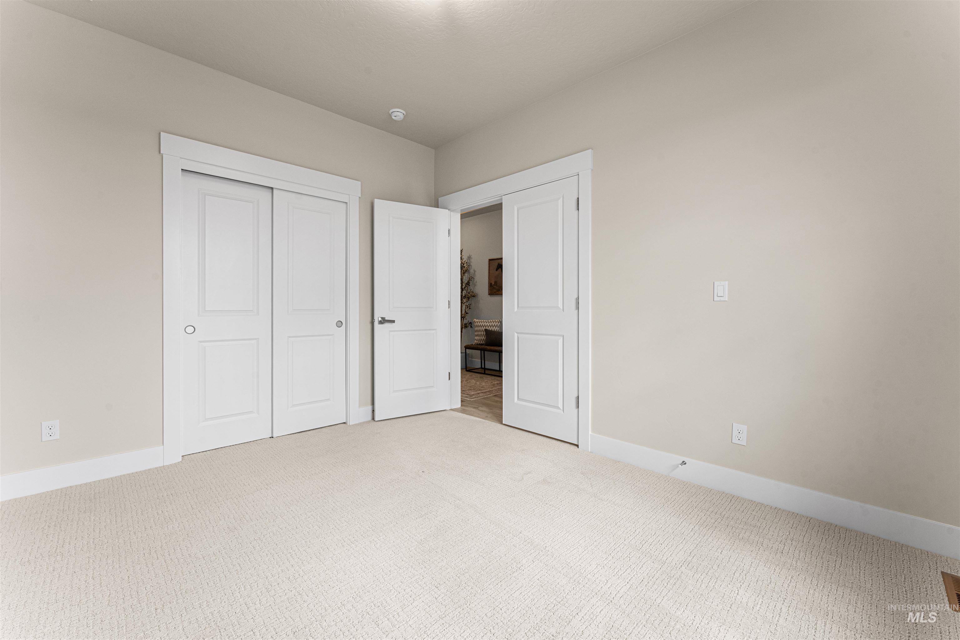 8078 Tandy Cv Street Middleton, ID 83644 - Photo 27 of 40 Unfurnished bedroom featuring carpet and a closet