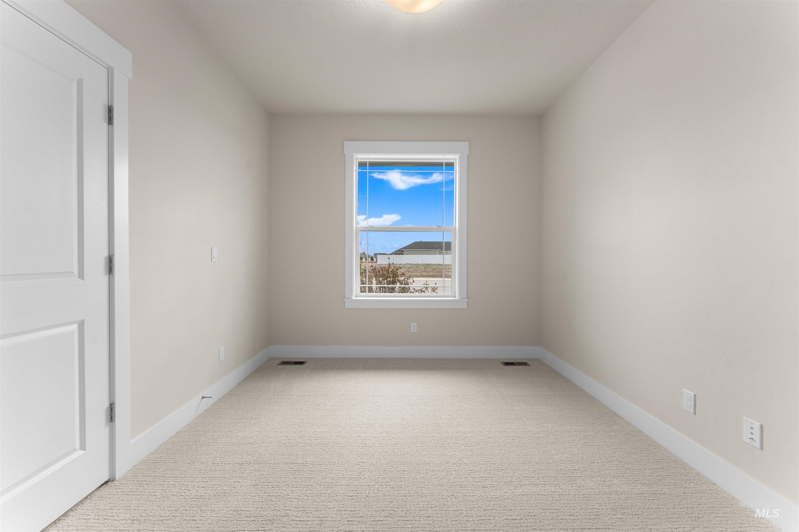 8078 Tandy Cv Street Middleton, ID 83644 - Photo 28 of 40 Unfurnished room featuring light colored carpet and baseboards