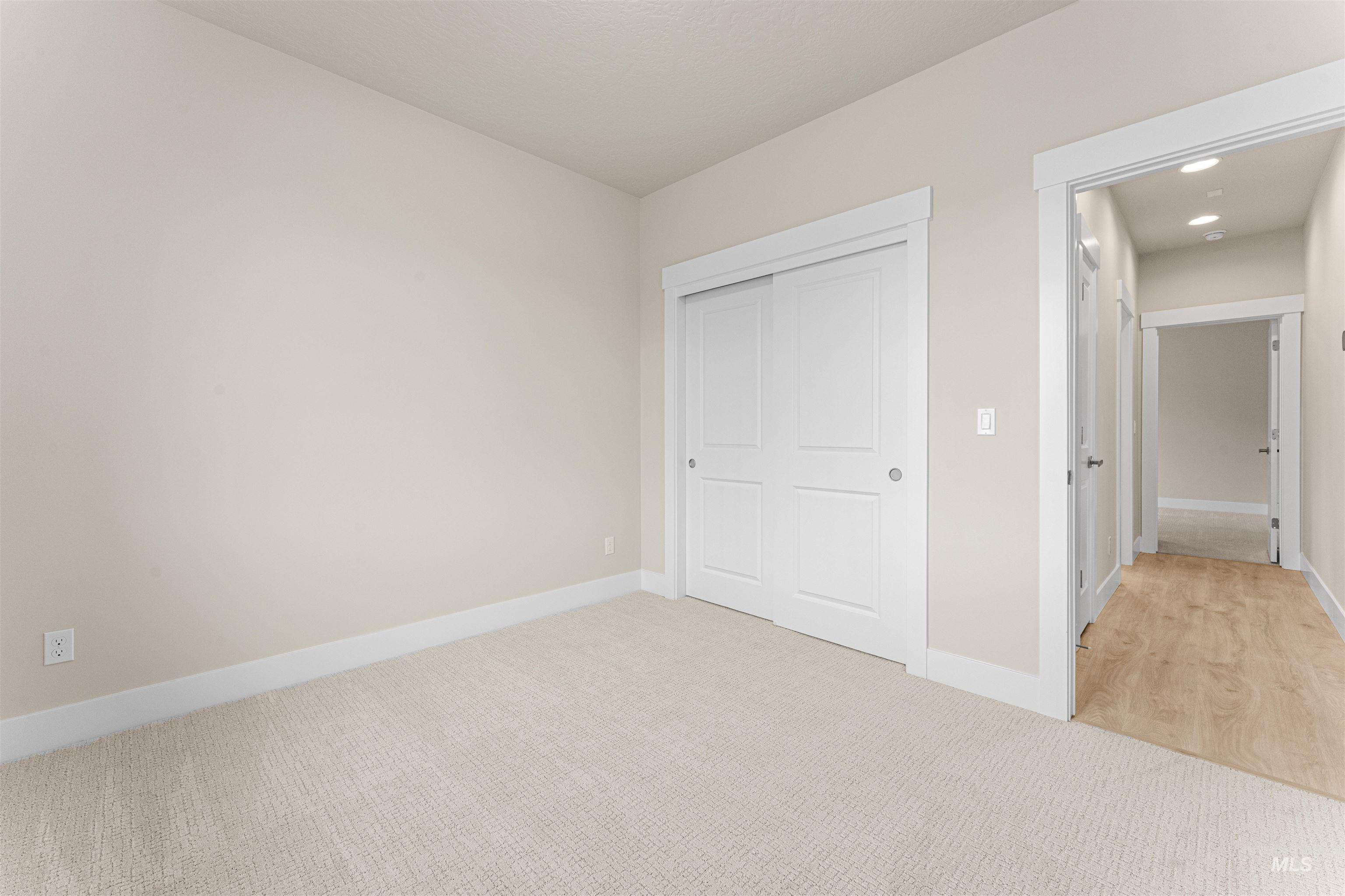 8078 Tandy Cv Street Middleton, ID 83644 - Photo 30 of 40 Unfurnished bedroom featuring light carpet and a closet