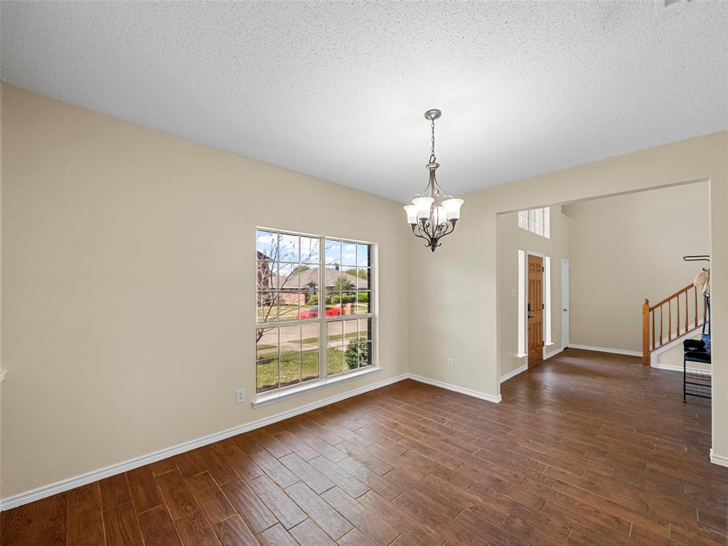 741 Aspen Court Allen, TX 75002 - Photo 11 of 40 Dinning room with suspended lighting, and wood tiled floors