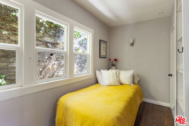 an aerial view of a house with outdoor space