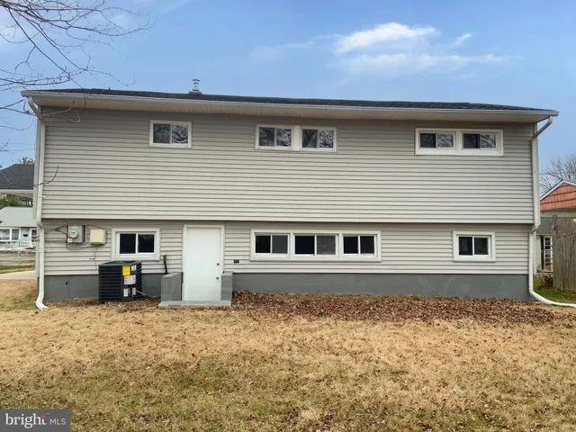 a house view with a backyard space