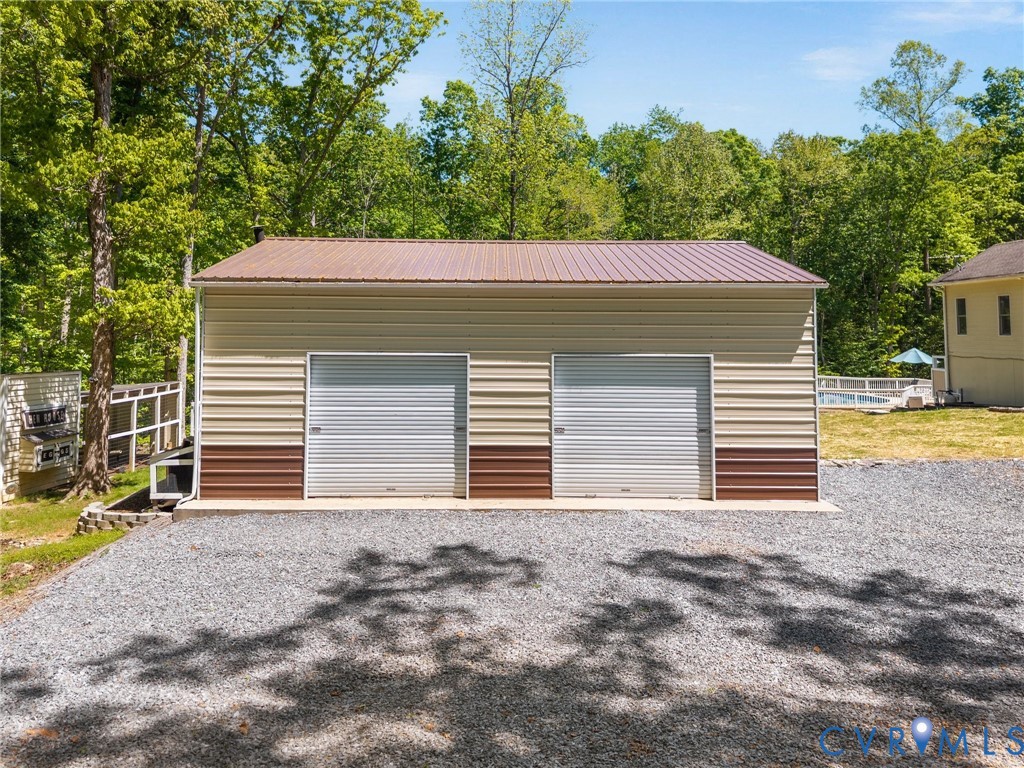 6126 Autumn Bluff Road Powhatan, VA 23139 - Photo 6 of 47 Detached Garage with Pedestrian Door.