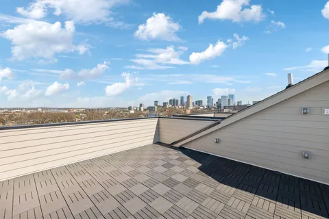 a view of a city from a balcony