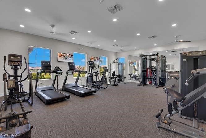 1064 Tranquil Brook Drive Naples, FL 34114 - Photo 26 of 28 a view of a room with gym equipment