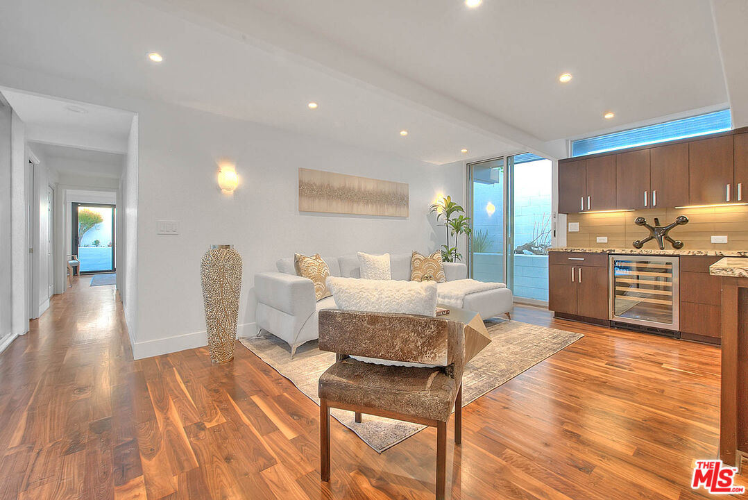 3804 Duray Place Los Angeles, CA 90008 - Photo 27 of 73 a living room with a couch and a wooden floor