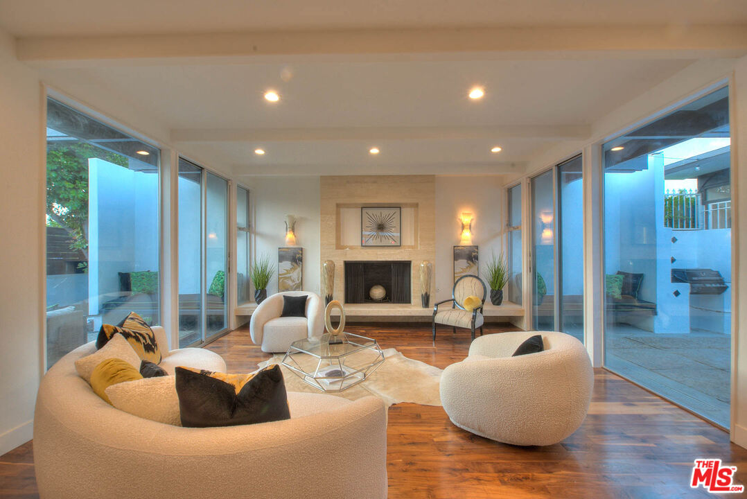 3804 Duray Place Los Angeles, CA 90008 - Photo 29 of 73 a living room with fireplace furniture and a fireplace