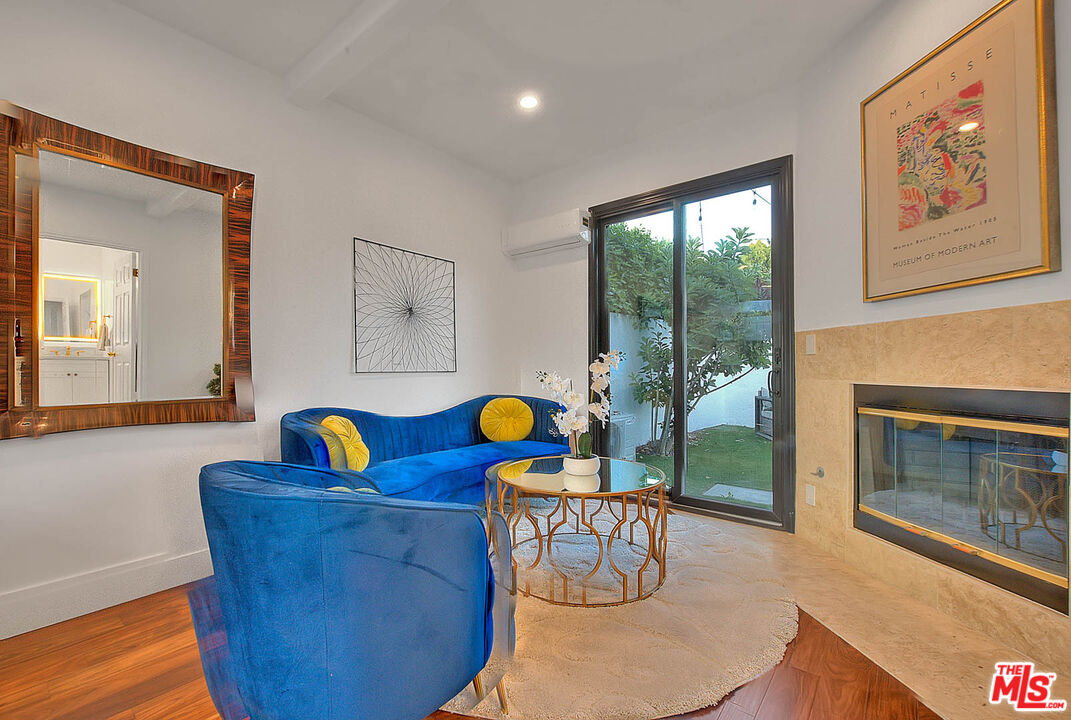 3804 Duray Place Los Angeles, CA 90008 - Photo 48 of 73 a living room with furniture and a fireplace