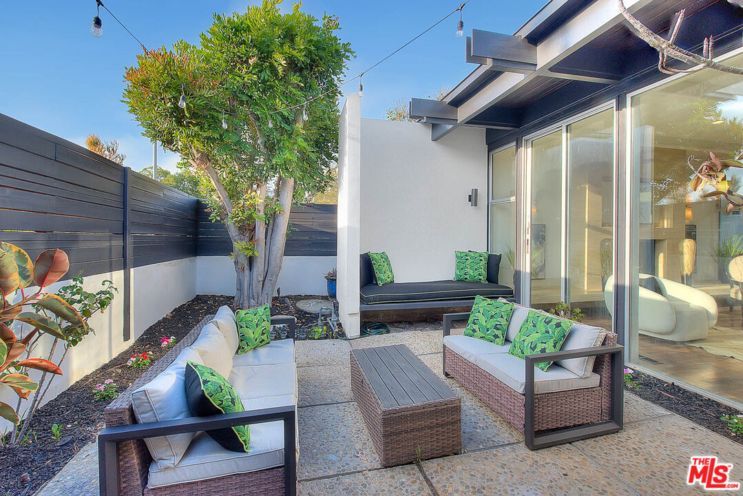 3804 Duray Place Los Angeles, CA 90008 - Photo 68 of 73 a view of patio with couches and potted plants