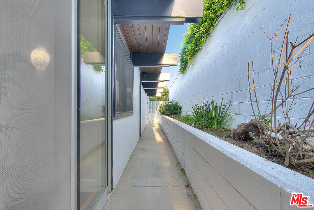 3804 Duray Place Los Angeles, CA 90008 - Photo 70 of 73 a view of a potted plants next to a building