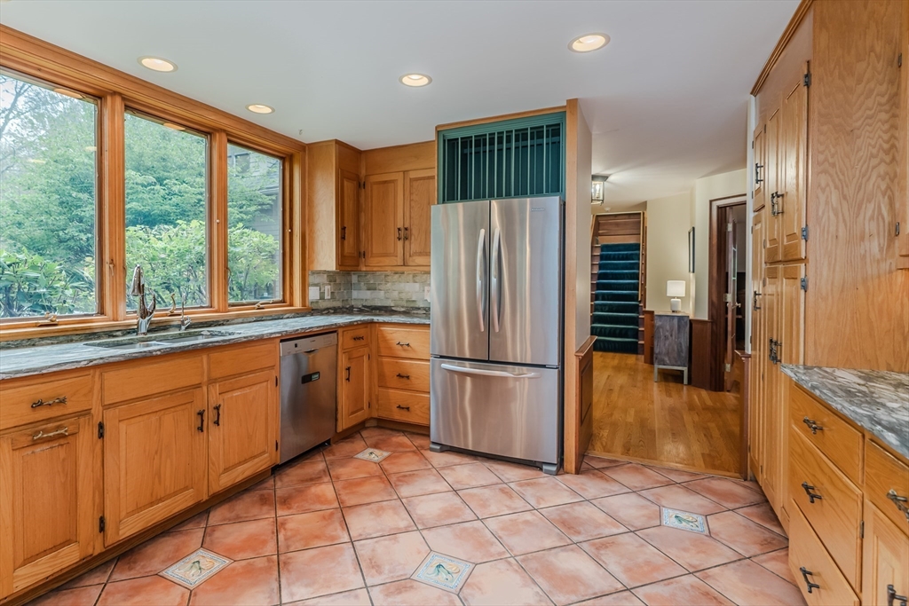 71 Mathews Road South Deerfield, MA 01373 - Photo 12 of 42 a kitchen with granite countertop a refrigerator and a sink