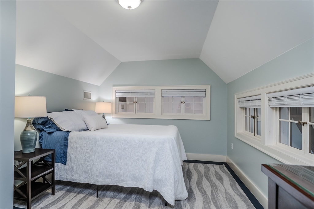 71 Mathews Road South Deerfield, MA 01373 - Photo 25 of 42 a bedroom with a bed and wooden floor