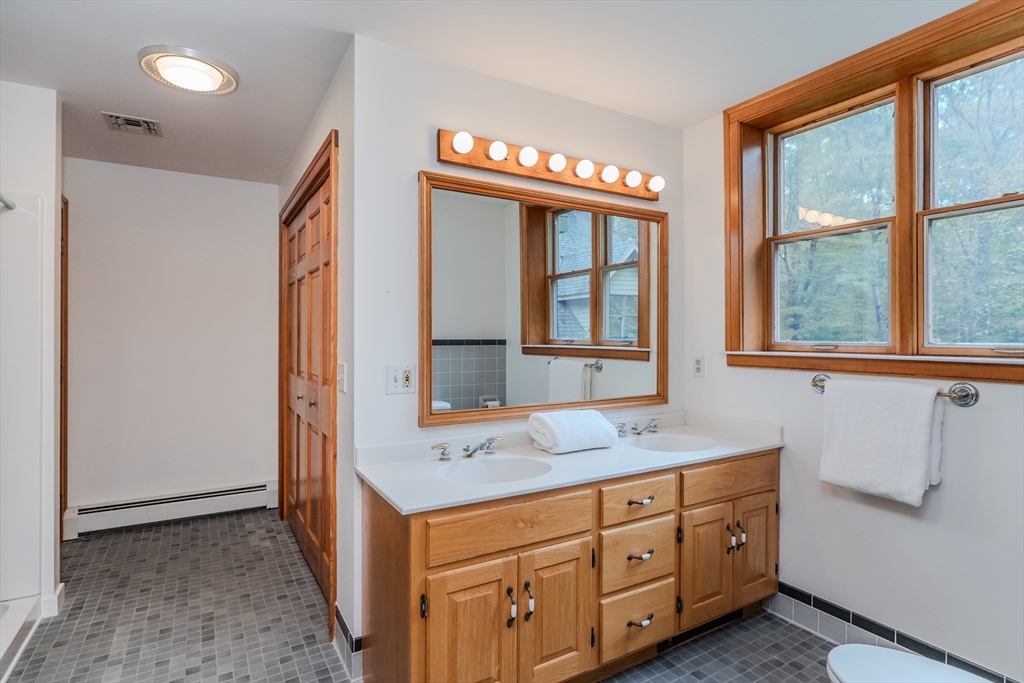 71 Mathews Road South Deerfield, MA 01373 - Photo 39 of 42 a bathroom with a sink and a mirror