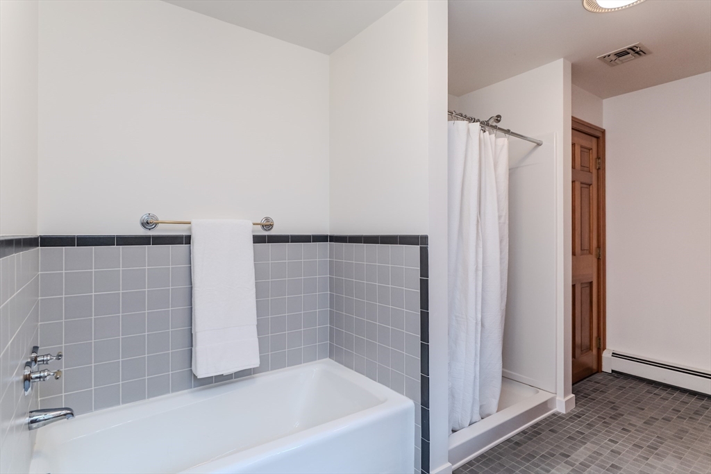 71 Mathews Road South Deerfield, MA 01373 - Photo 40 of 42 a bathroom with a bathtub