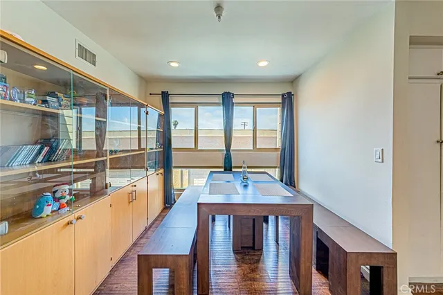 a view of a living room and dining room
