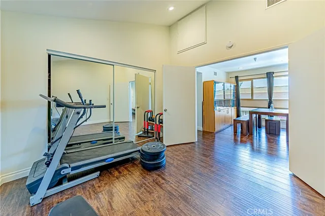 a livingroom with furniture and wooden floor