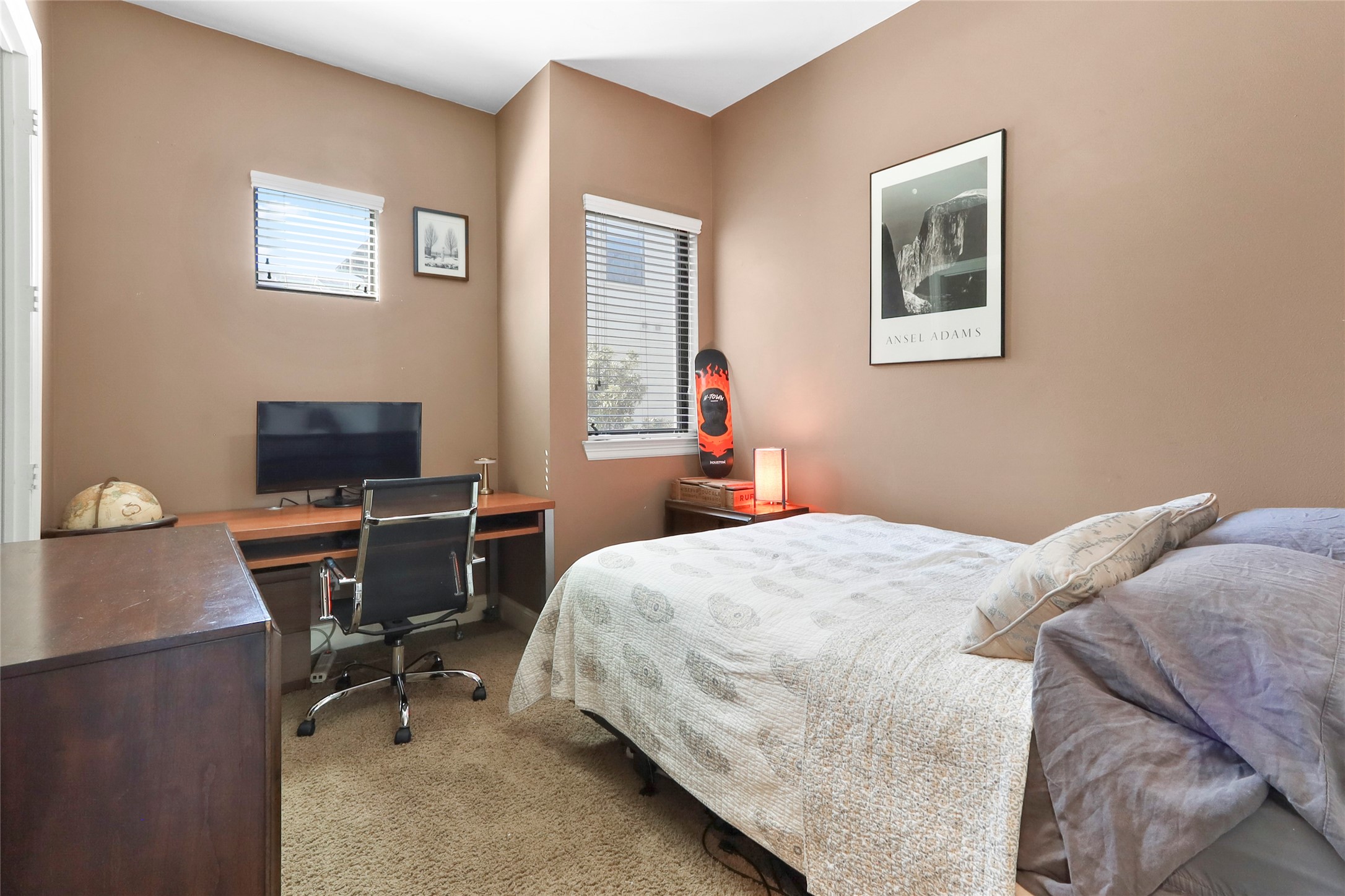 1905 Summer Street Houston, TX 77007 - Photo 11 of 25 a bedroom with a bed and a table