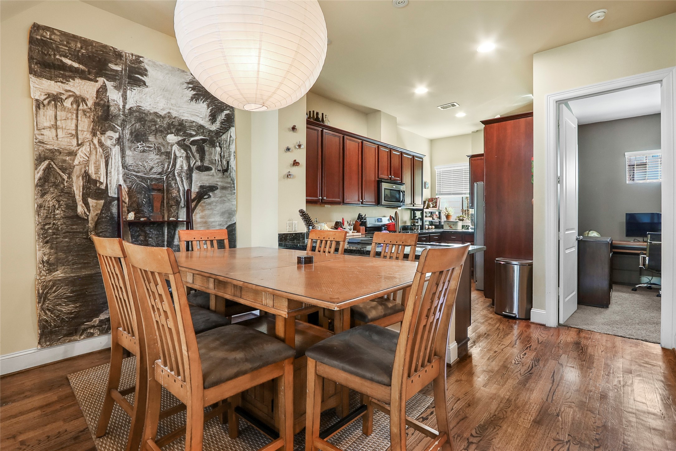 1905 Summer Street Houston, TX 77007 - Photo 7 of 25 a dining room with furniture and a mirror