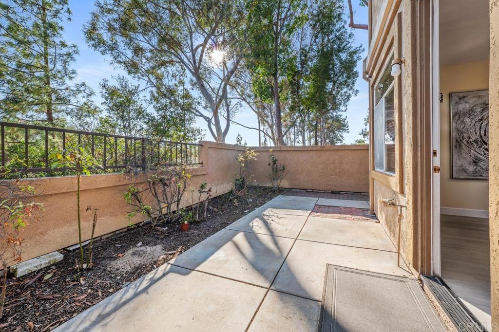 12490 Heatherton Court, Unit 8 San Diego, CA 92128 - Photo 16 of 30 a view of a backyard