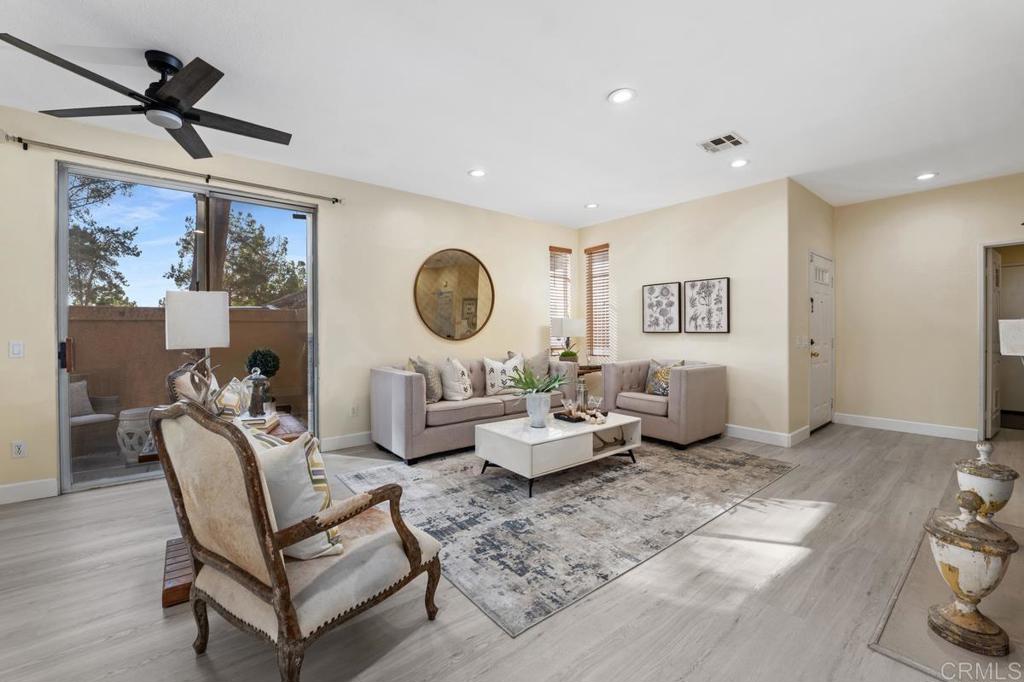 12490 Heatherton Court, Unit 8 San Diego, CA 92128 - Photo 8 of 30 a living room with furniture