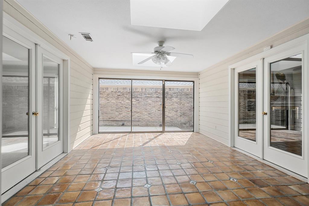 12616 Sunlight Drive Dallas, TX 75230 - Photo 18 of 40 a view of an empty room with windows