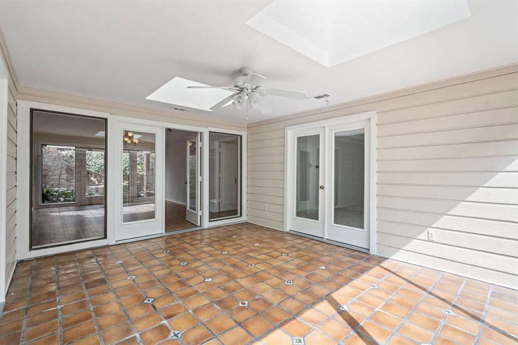 12616 Sunlight Drive Dallas, TX 75230 - Photo 19 of 40 a view of an empty room with a window