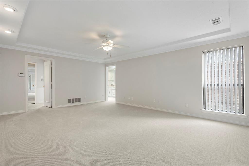 12616 Sunlight Drive Dallas, TX 75230 - Photo 22 of 40 a view of an empty room with a window