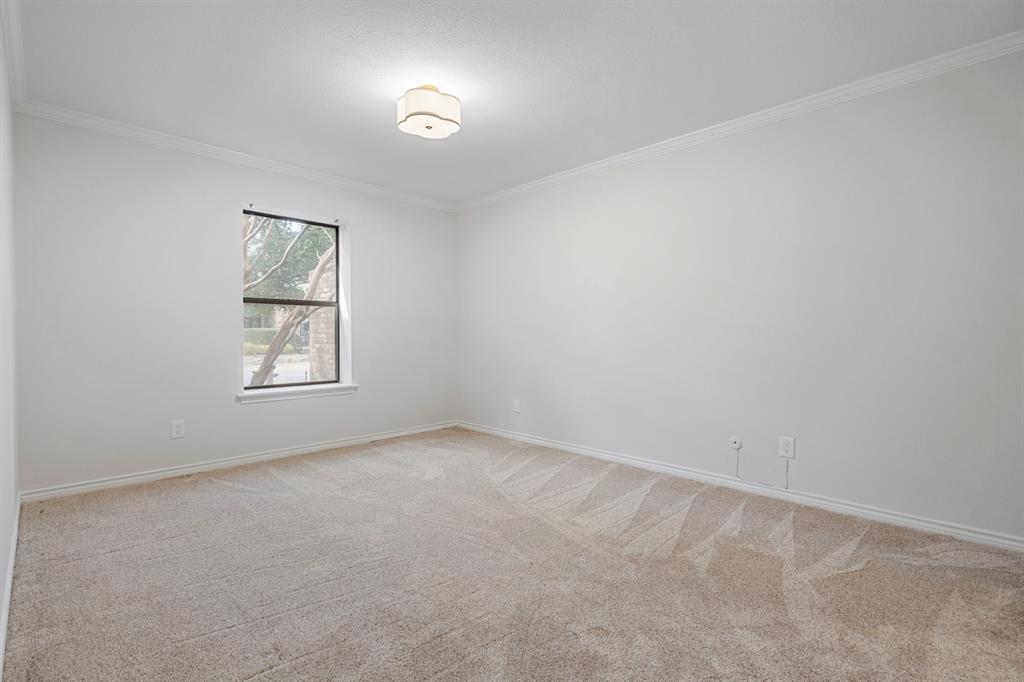 12616 Sunlight Drive Dallas, TX 75230 - Photo 27 of 40 an empty room with windows and closet