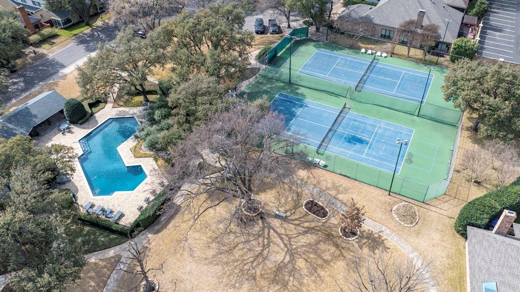 12616 Sunlight Drive Dallas, TX 75230 - Photo 38 of 40 an aerial view of a house with a yard