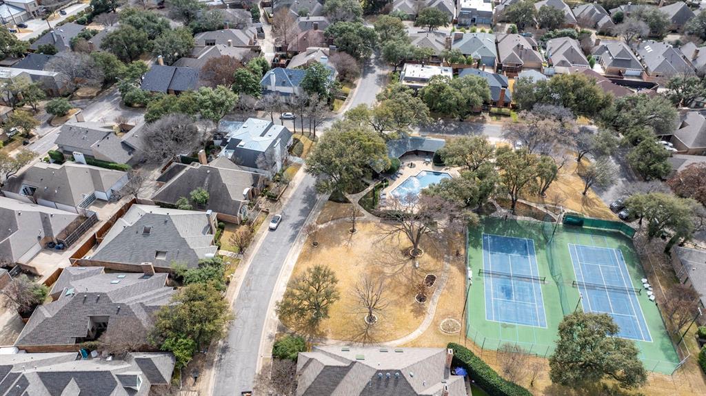12616 Sunlight Drive Dallas, TX 75230 - Photo 40 of 40 an aerial view of residential house with outdoor space and swimming pool