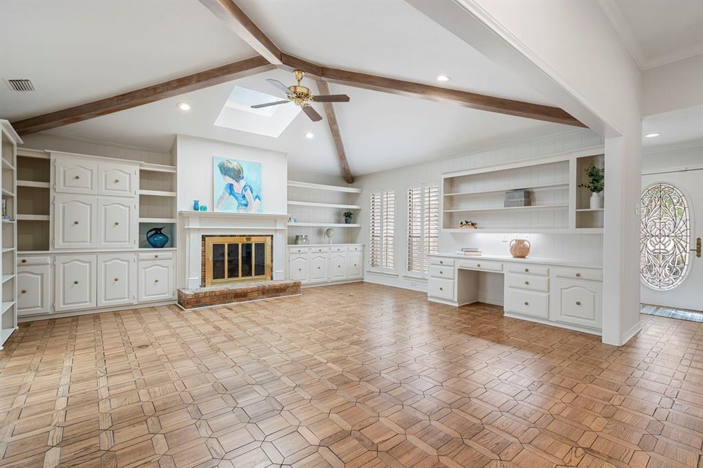 12616 Sunlight Drive Dallas, TX 75230 - Photo 7 of 40 a view of a kitchen with furniture and cabinets