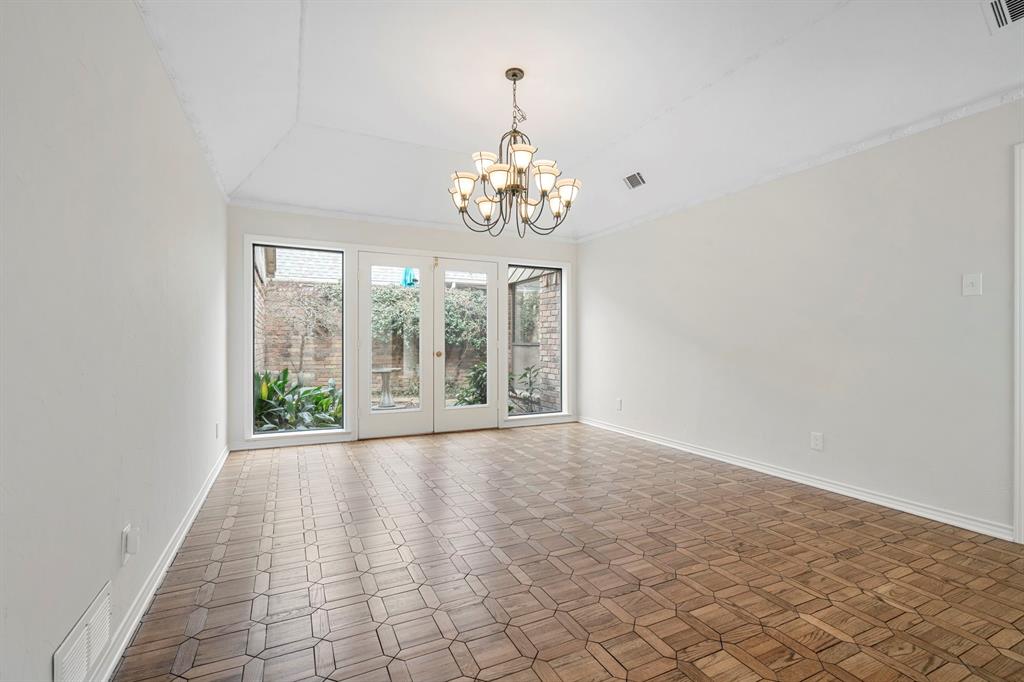 12616 Sunlight Drive Dallas, TX 75230 - Photo 10 of 40 wooden floor in an empty room with a window