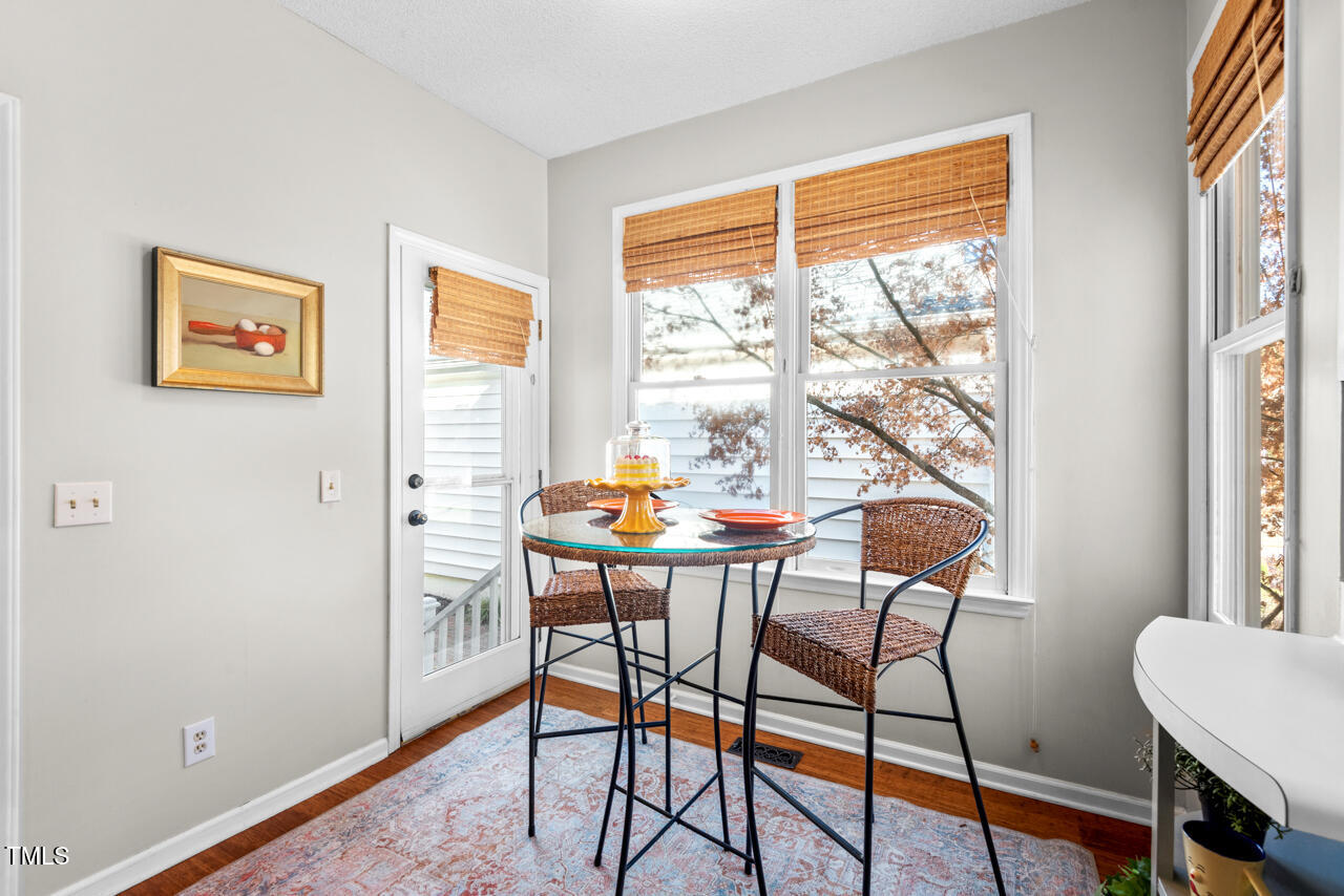 125 Legacy Lane Durham, NC 27713 - Photo 11 of 37 a dining room with furniture and window
