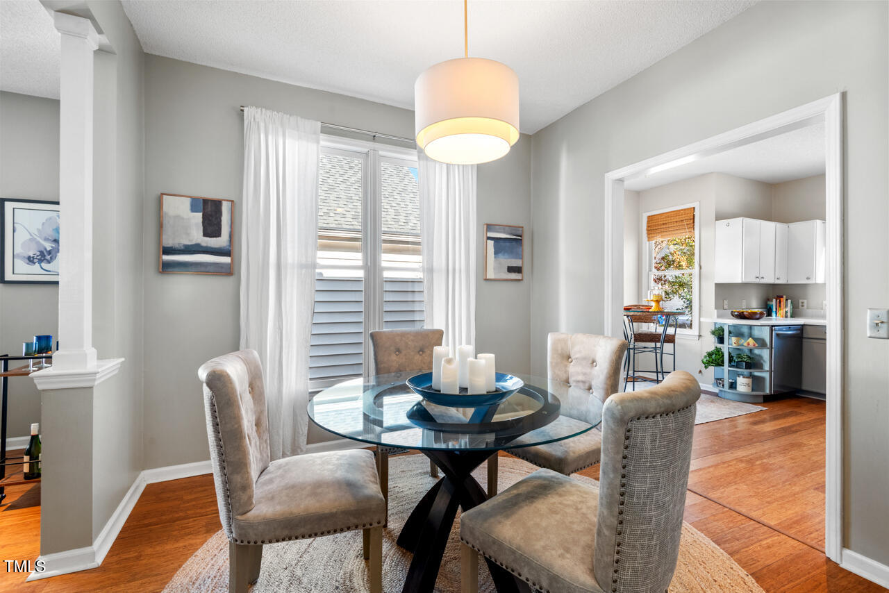 125 Legacy Lane Durham, NC 27713 - Photo 13 of 37 a dining room with furniture and window