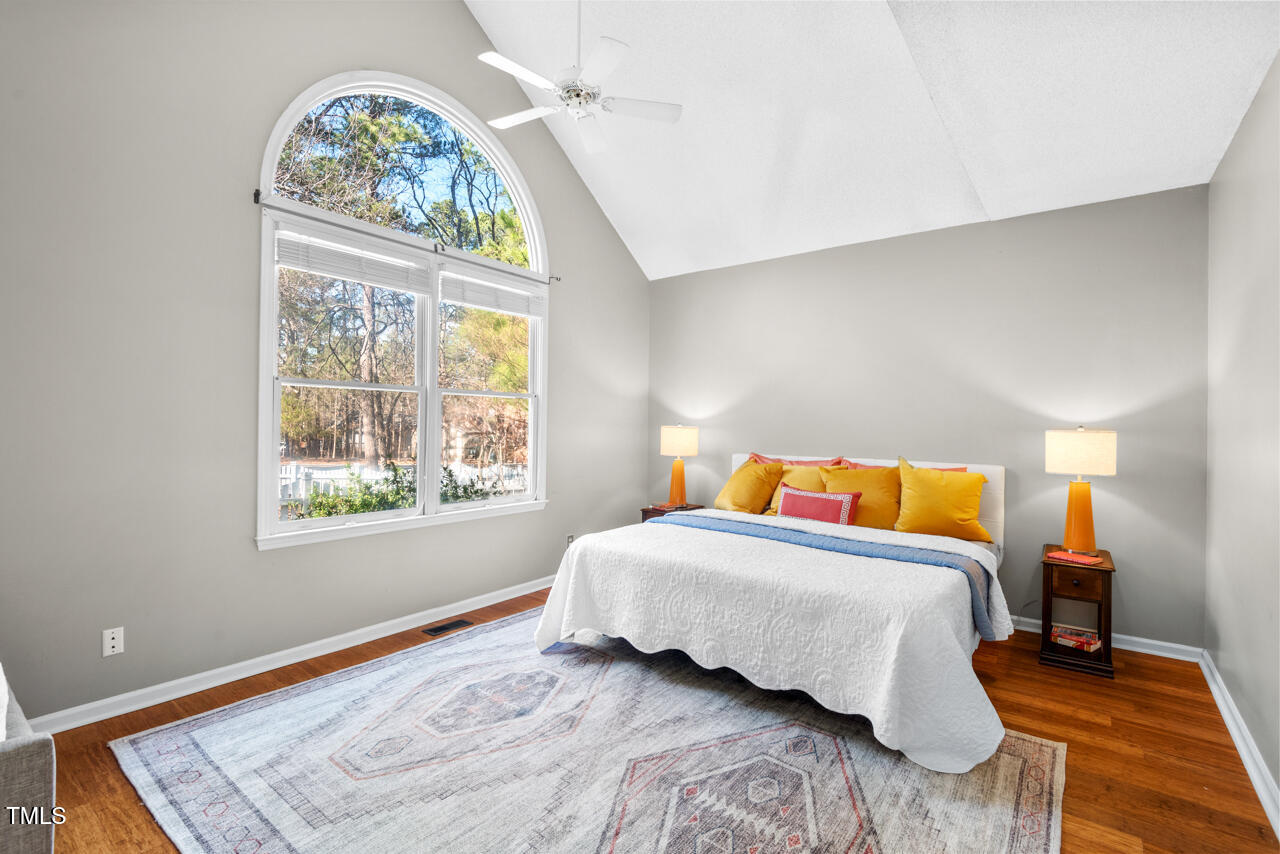 125 Legacy Lane Durham, NC 27713 - Photo 14 of 37 a bedroom with a bed and a window