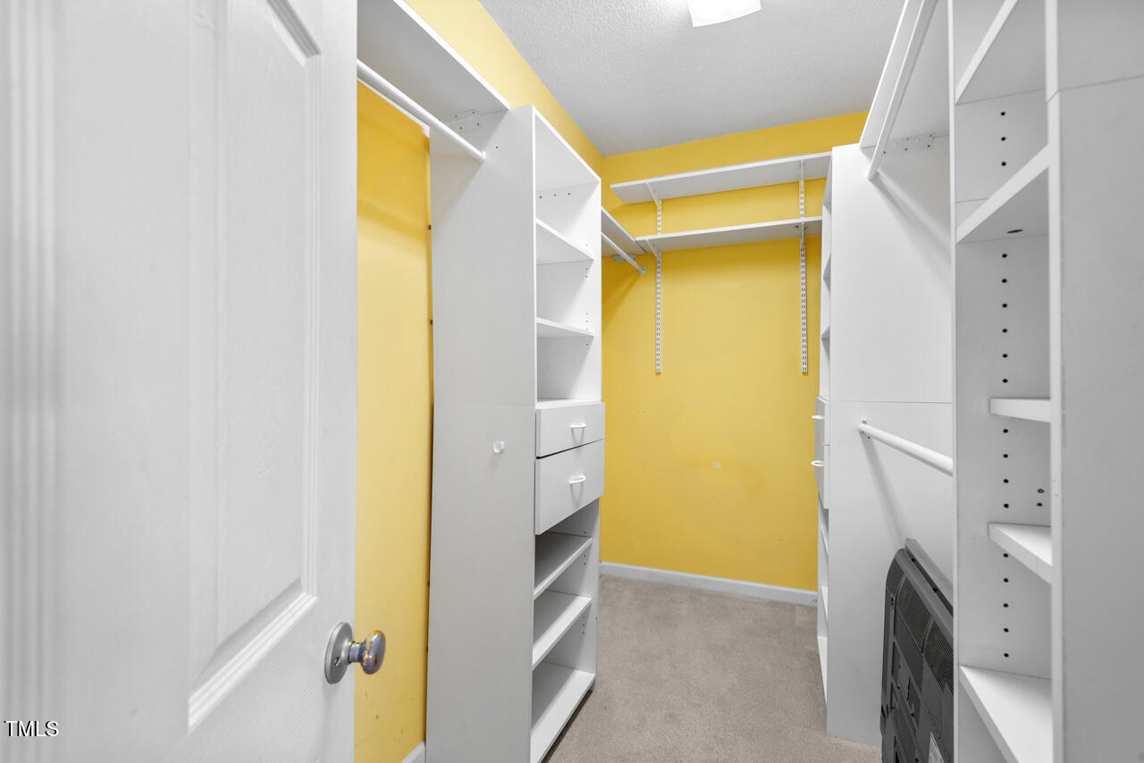 125 Legacy Lane Durham, NC 27713 - Photo 19 of 37 a view of walk in closet with large window