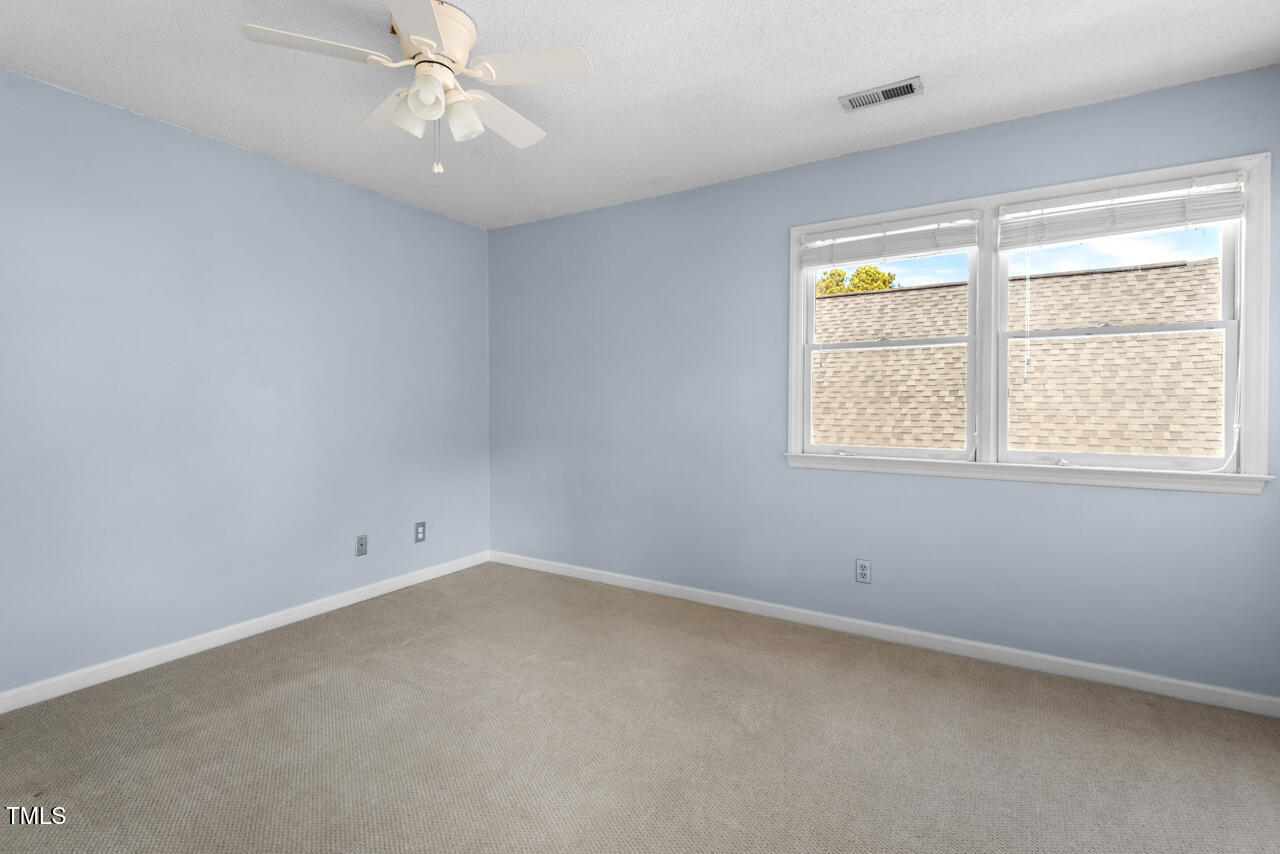 125 Legacy Lane Durham, NC 27713 - Photo 20 of 37 an empty room with a window