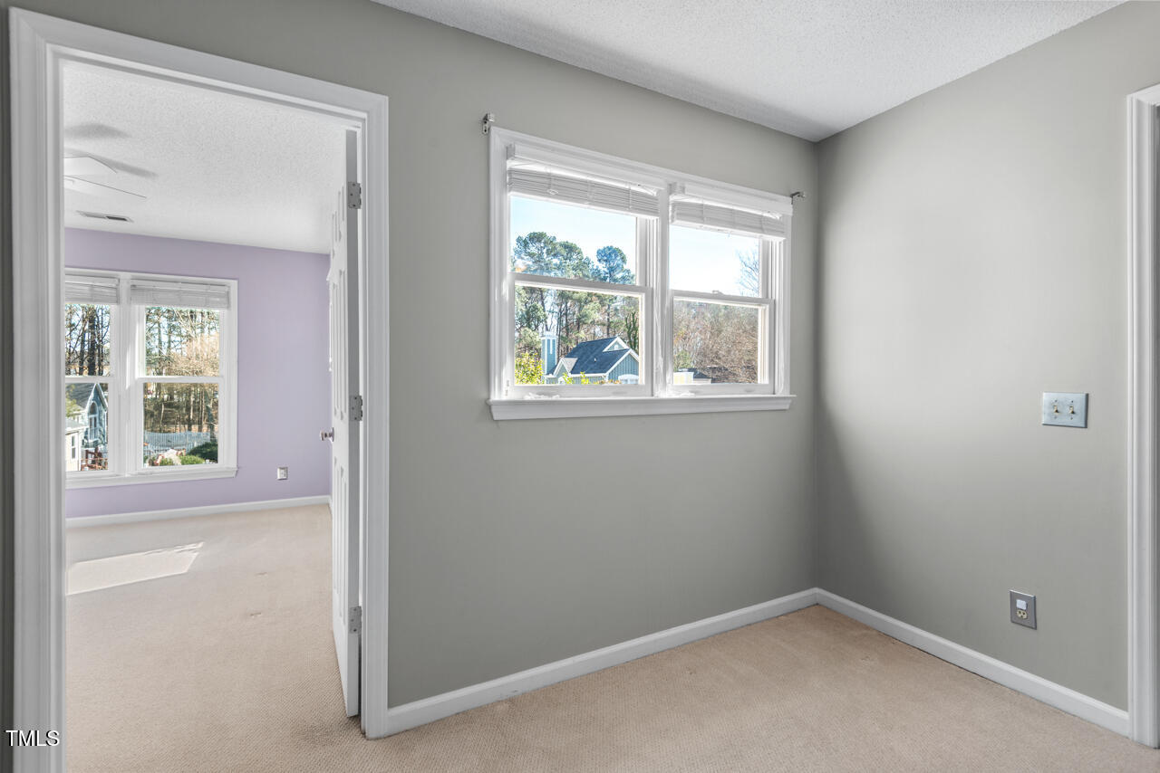 125 Legacy Lane Durham, NC 27713 - Photo 24 of 37 a view of an empty room with a window