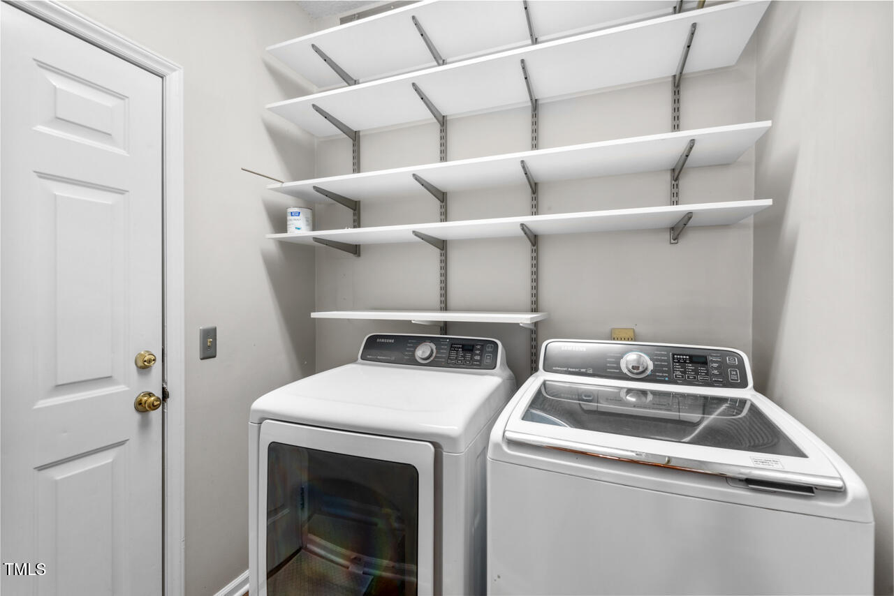 125 Legacy Lane Durham, NC 27713 - Photo 28 of 37 a utility room with dryer and washer
